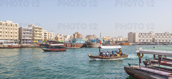 Small traditional ships and old dhow on the creek