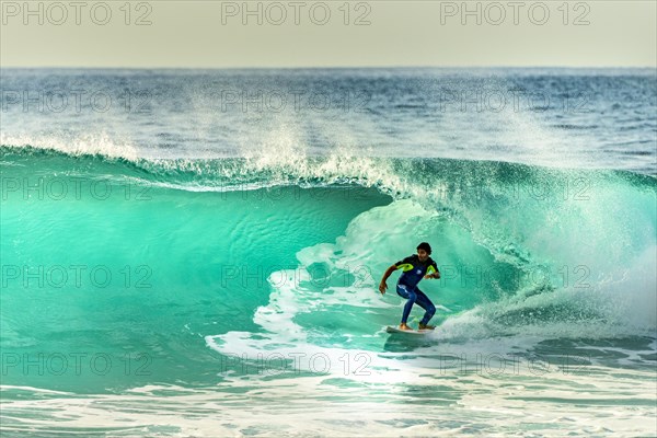 Surfer with large wave