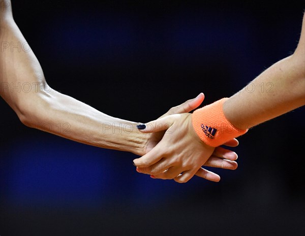 High five at double-tennis