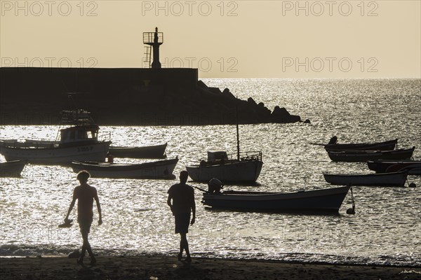 Two men on the city beach