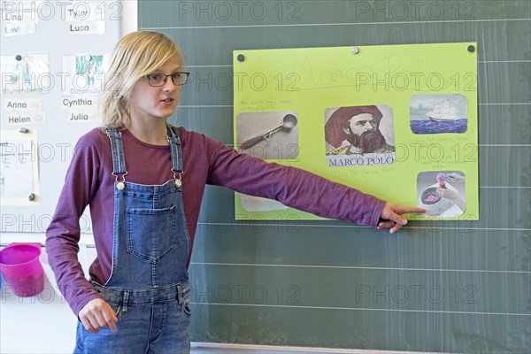 Schoolgirl at the blackboard