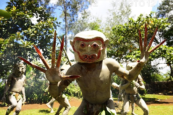 aThe mudmen of Asaro with their martial masks of clay