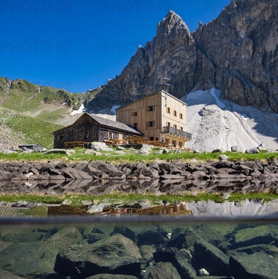 South Tyrolean Tribulaunhutte at lake