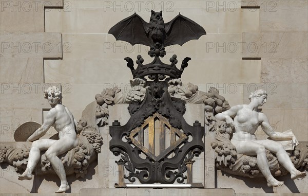 City coat of arms with bat and female figures by Mariano Benlliure