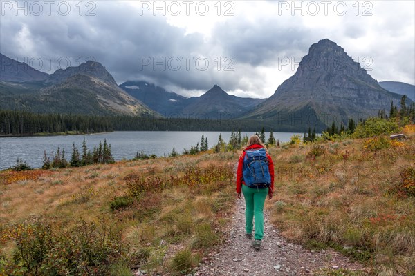 Woman walking on a hiking trail