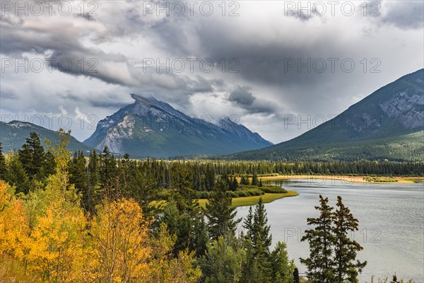 Autumnal mountain landscape with a lake