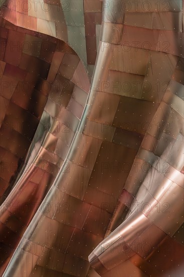 Copper coloured curved facade of the Museum of Pop Culture