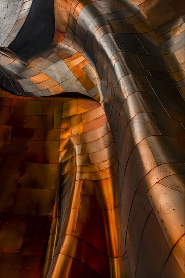 Copper coloured curved facade of the Museum of Pop Culture