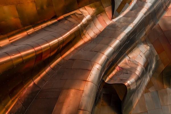 Copper coloured curved facade of the Museum of Pop Culture