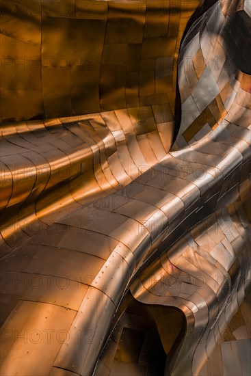 Copper coloured curved facade of the Museum of Pop Culture
