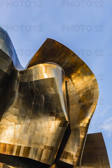 Copper coloured curved facade of the Museum of Pop Culture