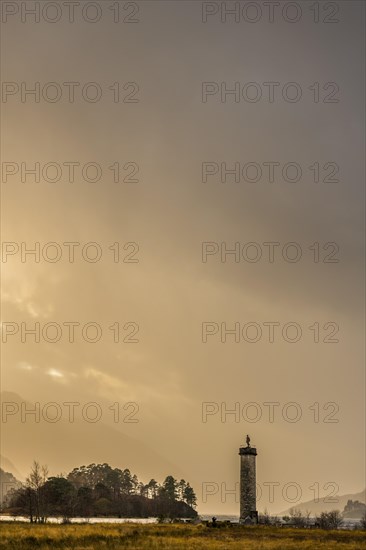Loch Shiel with Glenfinnan Monument under threatening cloudy sky