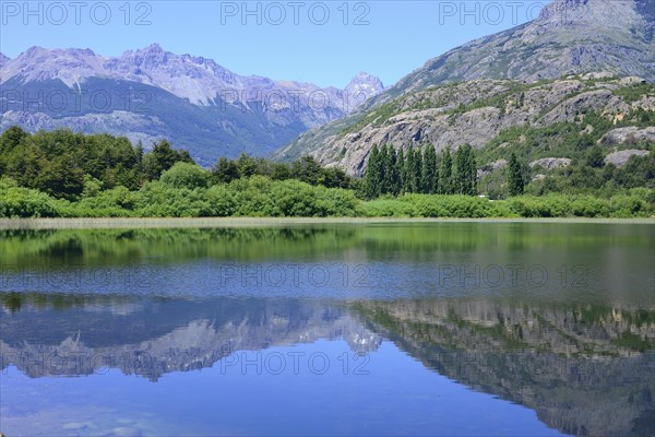 Mountain scenery reflected in the water of the Rio Futaleufu