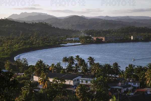 View of houses and the Bahia de Miel bay