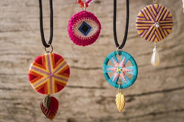 Four assorted Posamentenknopf chains