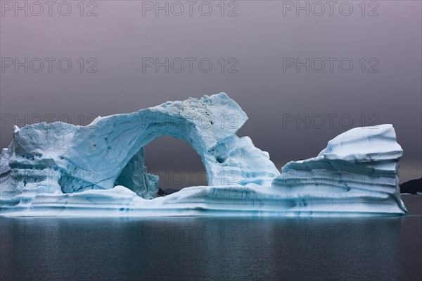 Ice bow in Scoresbysund at dawn