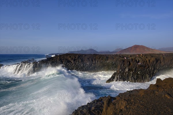 Surf at rocky coast