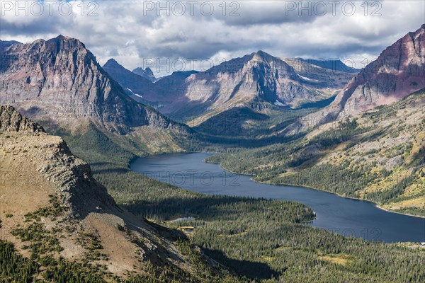 View from Continental Divide Trail onto Mountain Lake Two Medicine Lake with mountain landscape
