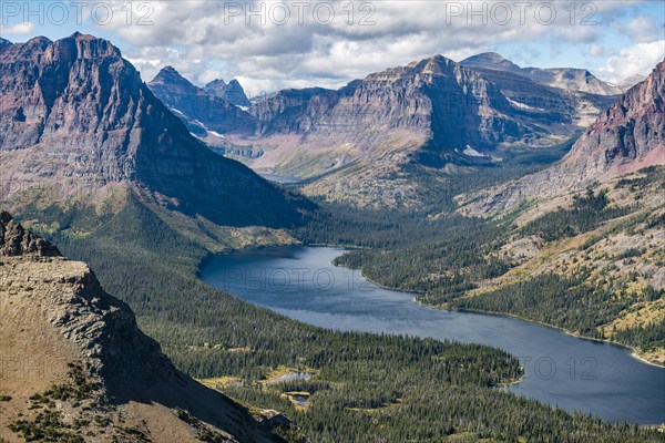 View from Continental Divide Trail onto Mountain Lake Two Medicine Lake with mountain landscape