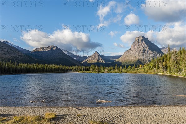 Mountain lake Two Medicine Lake in mountain landscape