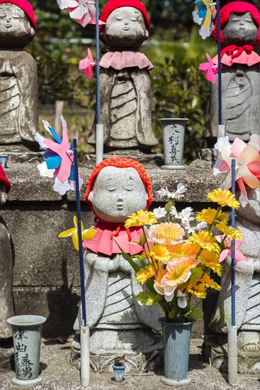 Jizo statues with red caps