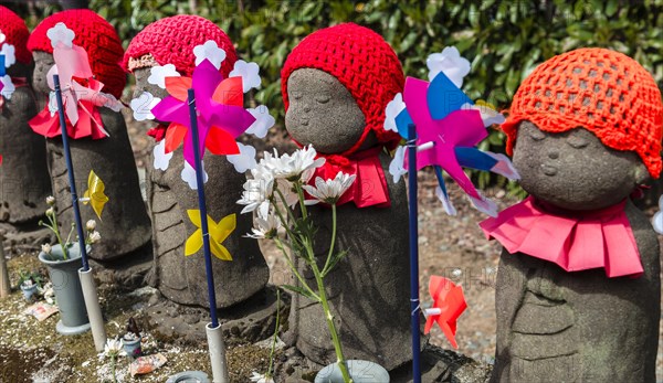 Jizo statues with red caps