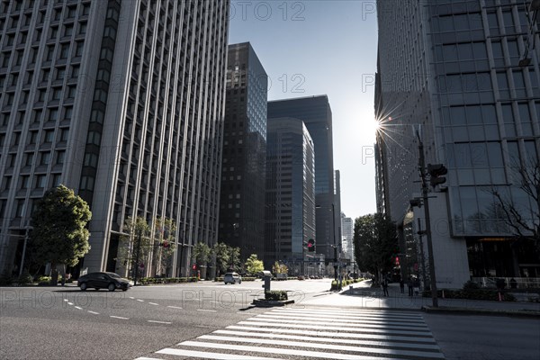 Traffic street in the city center with skyscrapers
