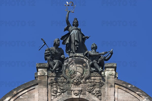 Ornametal gable from the Opera House with coat of arms of Nuremberg and sculptures