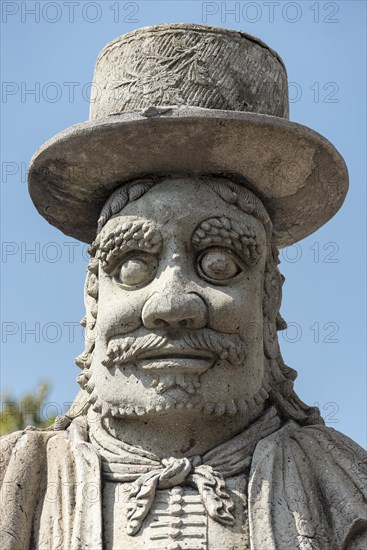 Chinese stone doll