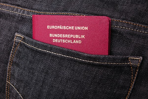 German passport of the European Union in trouser pocket