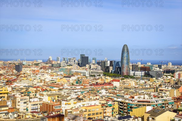 City view with houses and Torre Agbar by architect Jean Nouvel