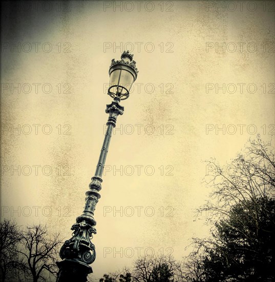 Lamppost in wrought iron and old fashioned