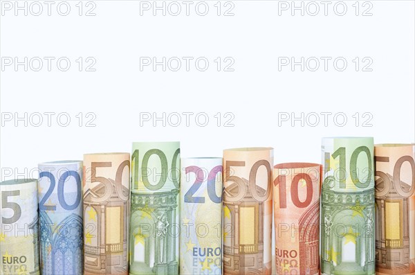 Rolls of various euro banknotes