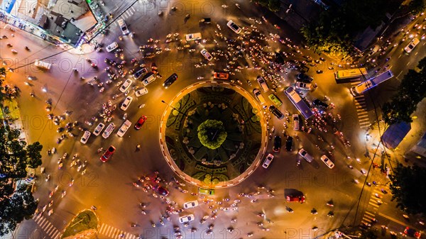 Illuminated Nga sau Cong Hoa traffic circle at night