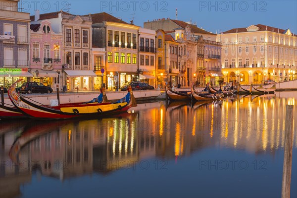 Moliceiros moored along the main canal at dusk