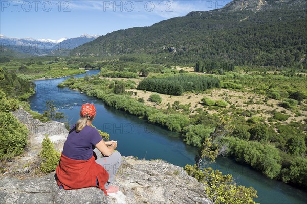 Tourist looking into river valley of Rio Futaleufu