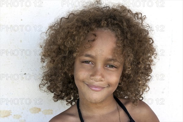 Local Cuban girl with curly hair