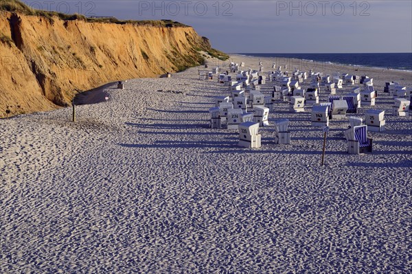 Beach and beach chairs at red cliff