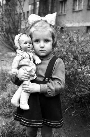 Girl with a doll
