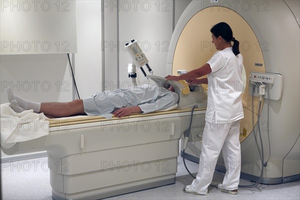 Nurse preparing a patient for RDG