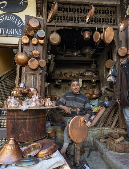 Coppersmith at work