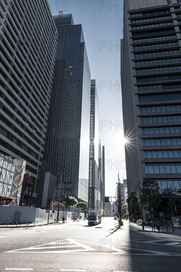 Traffic street in the city center with skyscrapers