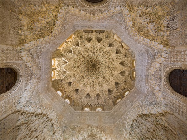 Arabesque Moorish stalactites or muqarnas in the hall Sala de los Abencerrajes