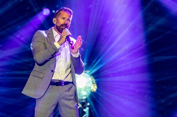 Swiss pop singer and presenter Leonard live at the 19th Schlagernacht in Lucerne