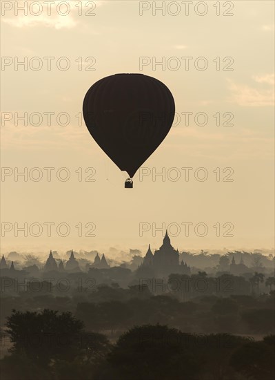 Hot-air Balloon in flight over temples of Bagan