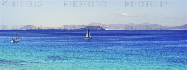 Sailboats in turquoise waters
