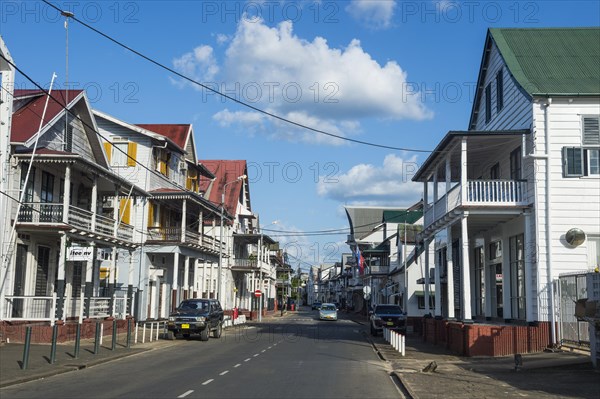 Street with dutch colonial wooden buildings