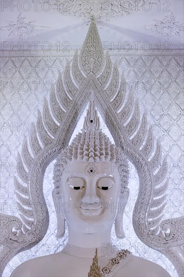 Buddha statue in the white prayer hall