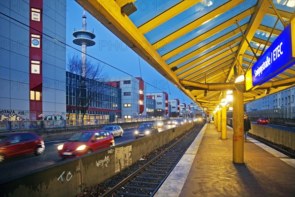 Subway stop Savignystrasse/ETEC directly next to the motorway A 40 at dusk