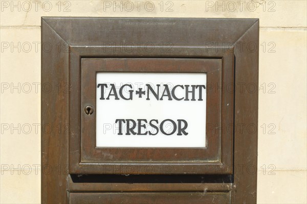 Writing on safe at bank